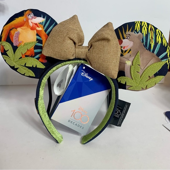 Disney Accessories - NWT. Disney DISNEY 100 CELEBRATION DECADES THE JUNGLE BOOK EAR HEADBAND